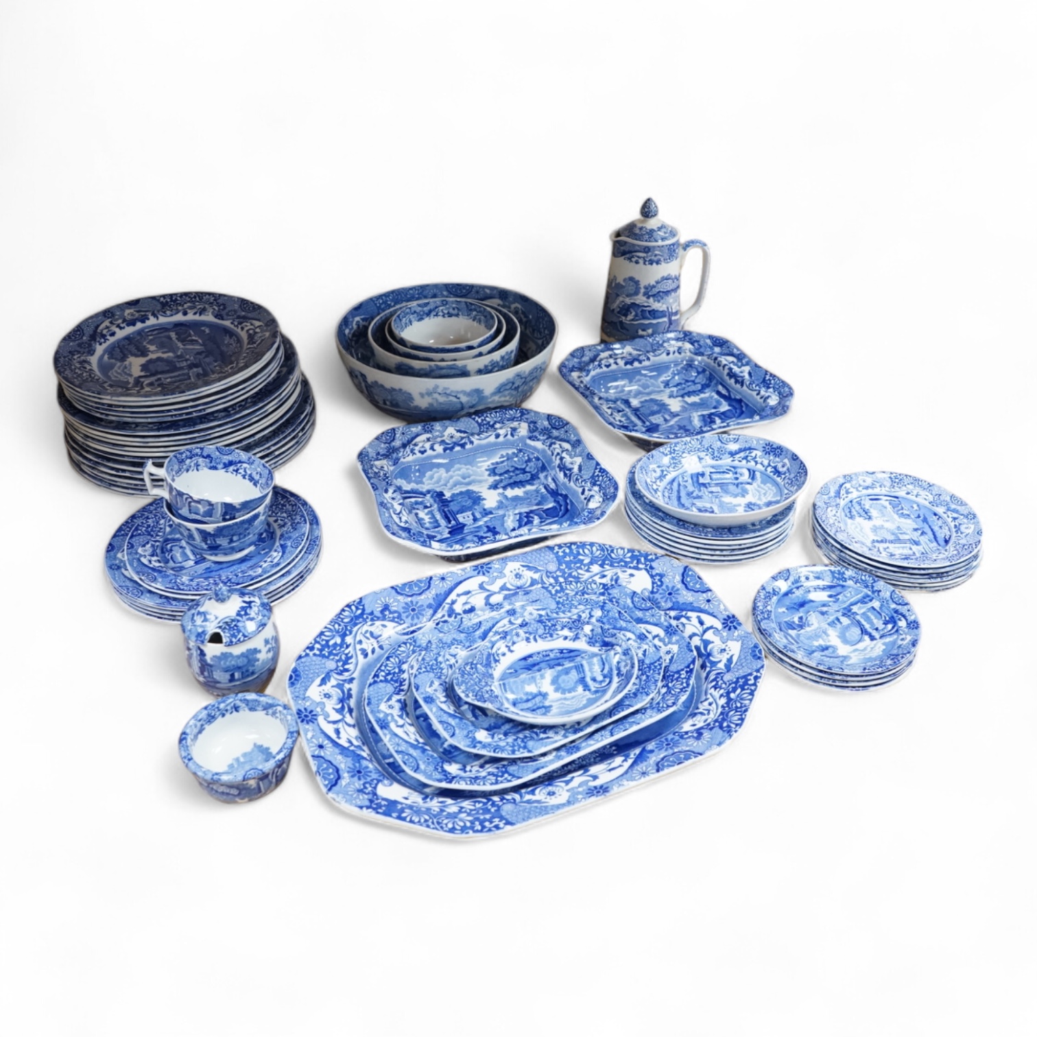 A Spode blue and white Italian service to include dinner plates, graduated bowls and platters, largest 37cm wide